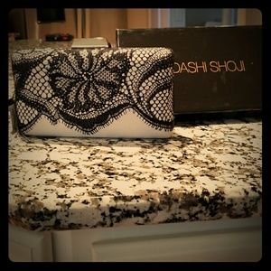 Tadashi Shoji bejewled lace black and white clutch